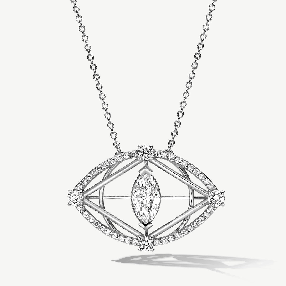 Diamond evil eye necklace with a geometric pendant on a white background